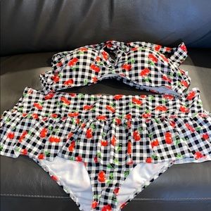 Two cherry print bathing suits